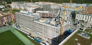 Neubau einer Wohnanlage mit 430 Wohneinheiten, 2 Gewerbeeinheiten und TG mit 416 Stellplätzen
