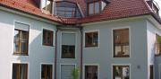 Schlüsselfertige Erstellung eines Mehrfamilienhauses mit 5 Wohnungen, 2 Doppelparkern und einer Einzelgarage