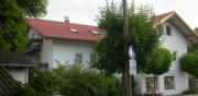 Neubau eines Mehrfamilienhauses mit einer Haushälfte und 3 Wohnungen