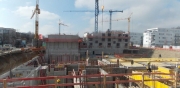 Neubau einer Wohnanlage mit 224 WE, 2 Gewerbeeinheiten, Kindergarten und Tiefgarage in Johanneskirchen, Bauzeit: Sept. 2015 - Okt. 2016